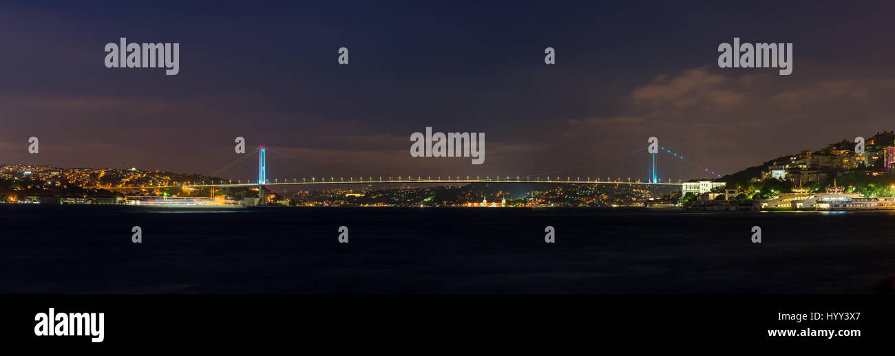 Bosphorus Bridge Panorama at night showing the European and Asian continents, Istanbul, Turkey Stock Photo