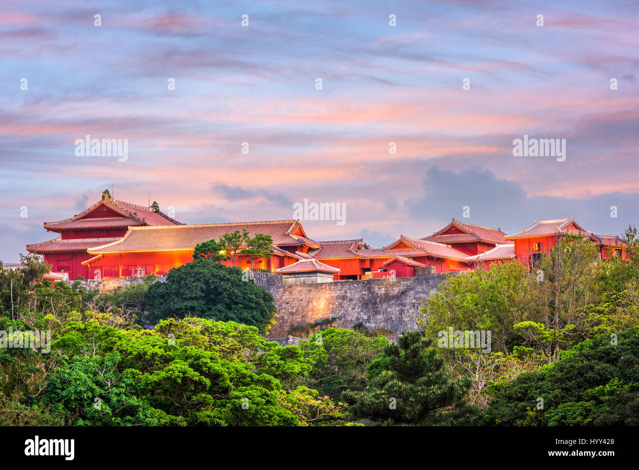 Shuri Castle, Okinawa, Japan illuminated at sunset. Stock Photo