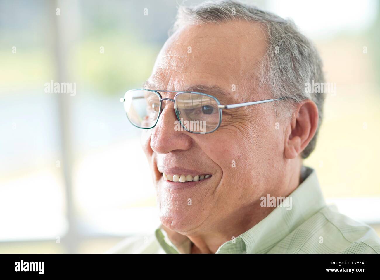 Senior man wearing glasses, portrait. Stock Photo