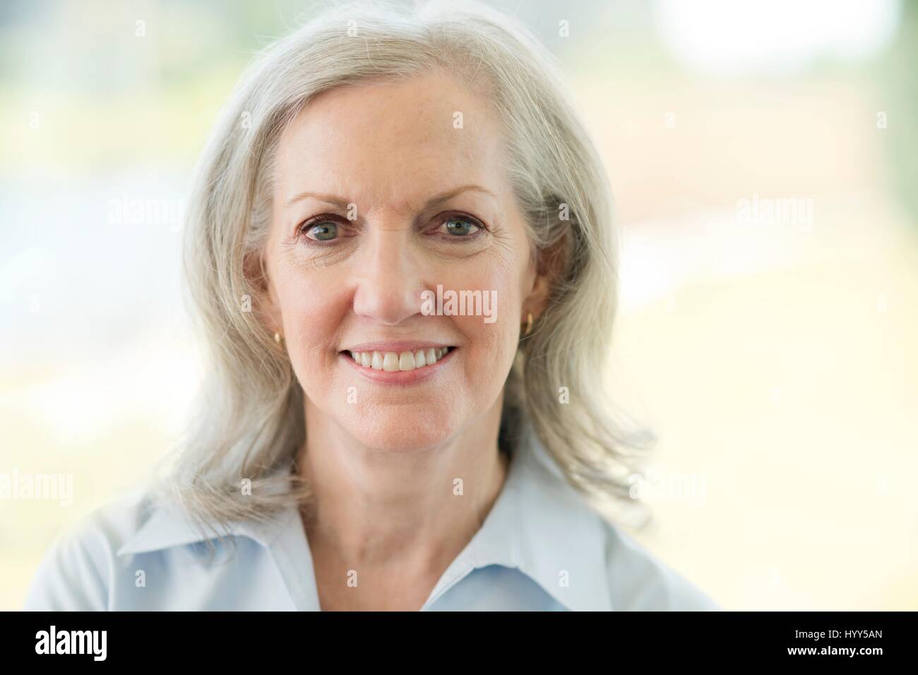 Senior woman smiling, portrait. Stock Photo