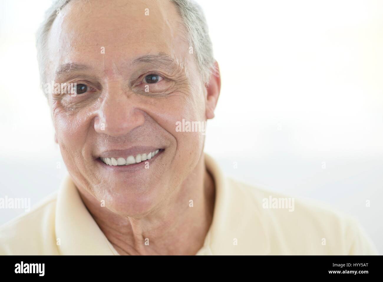Senior man smiling, portrait. Stock Photo