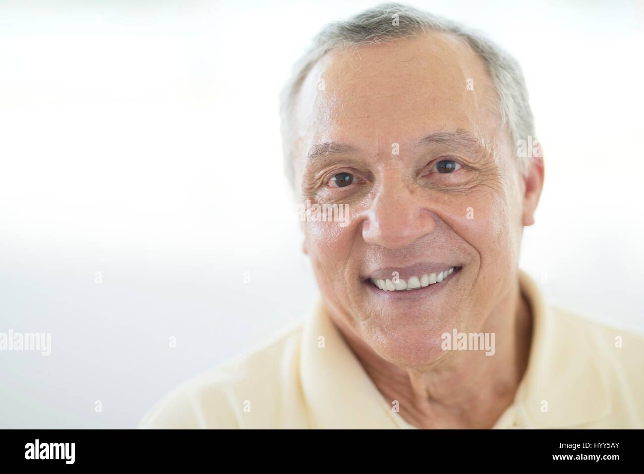 Senior man smiling, portrait. Stock Photo