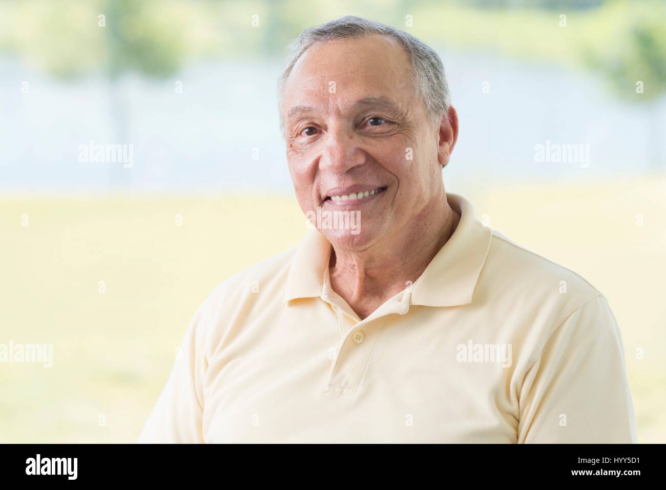 Senior man smiling, portrait. Stock Photo