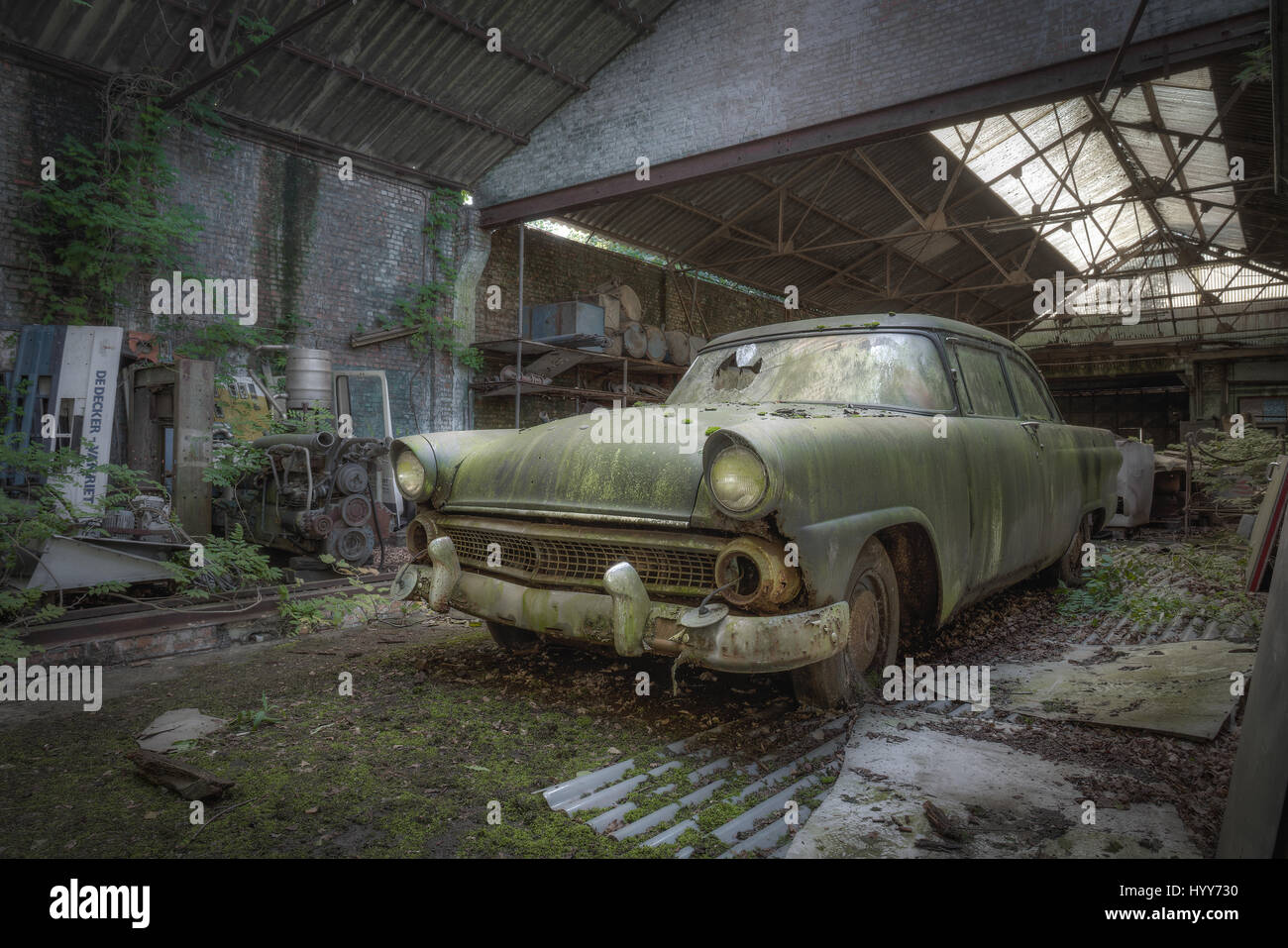 STUNNING images reveal the vulnerable beauty of abandoned cars that have been left to rust over the years. The collection of spectacular images show how a Volkswagen Beetle, Citroën C2 and even a Ferrari have been taken over by nature and piles of rubble. In other shots, a Mercedes Benz is overgrown with ivy and an old-fashioned BMW has been left in a garage with a collapsing roof and debris on the floor. A Ford vehicle has also been forgotten in the woods and one car even appears to have a tree growing from it. The haunting images were taken by Belgian security guard, Kenneth Provost (31) at  Stock Photo