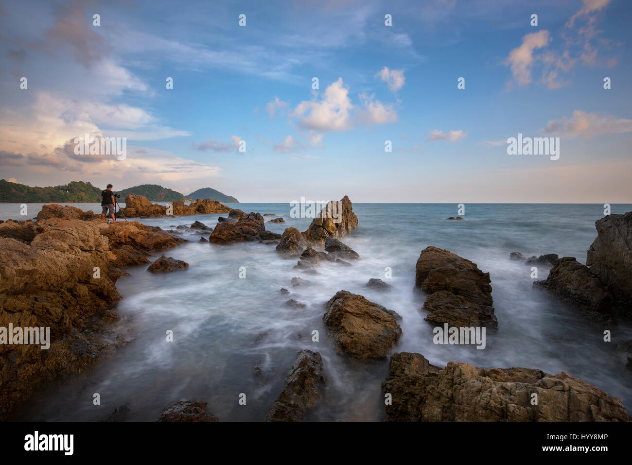 The beautiful silky smooth water waves and rocks at hinkrong Chanthaburi,Thailand Stock Photo