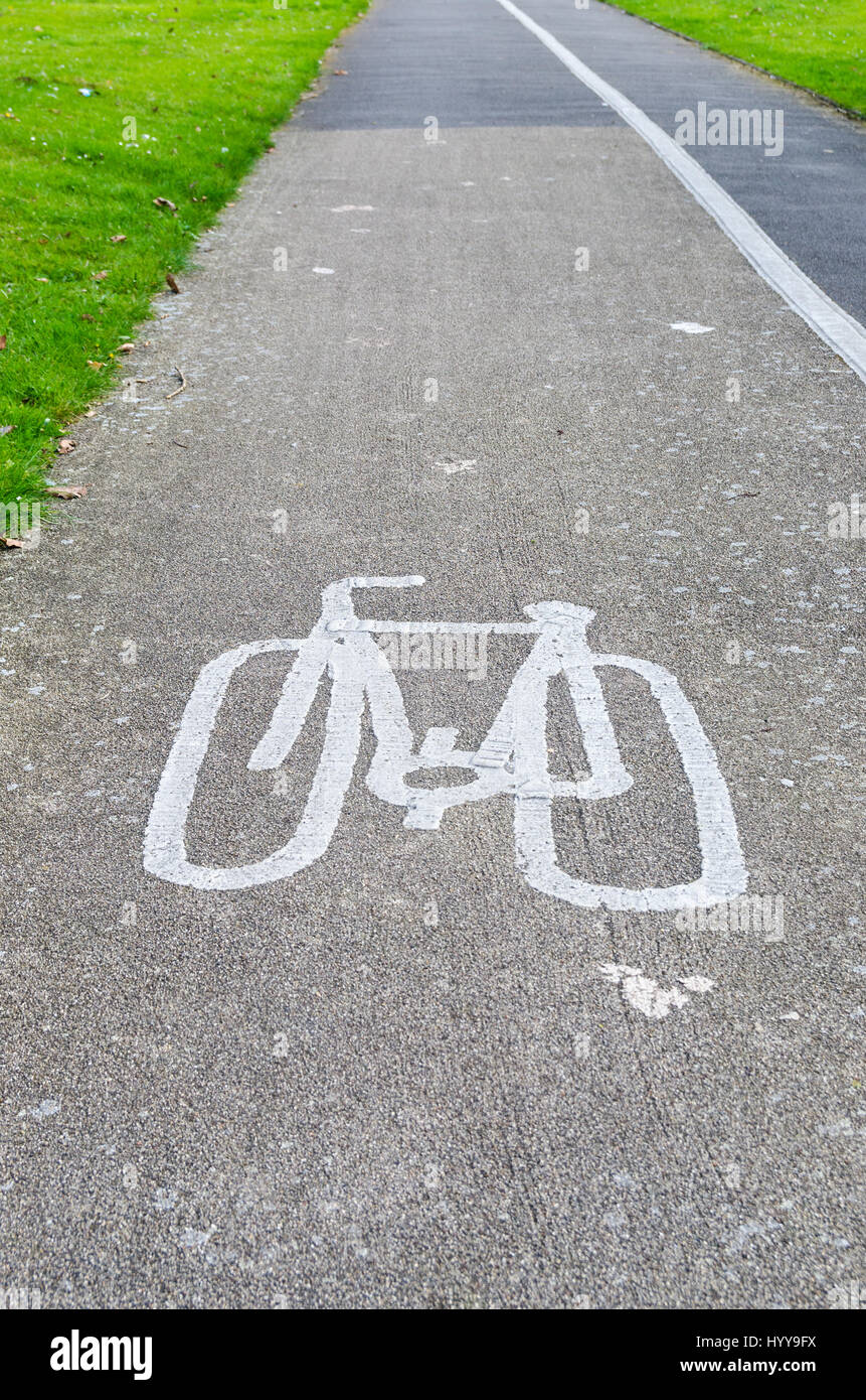 Cycle path with picture of bicycle painted on tarmac Stock Photo