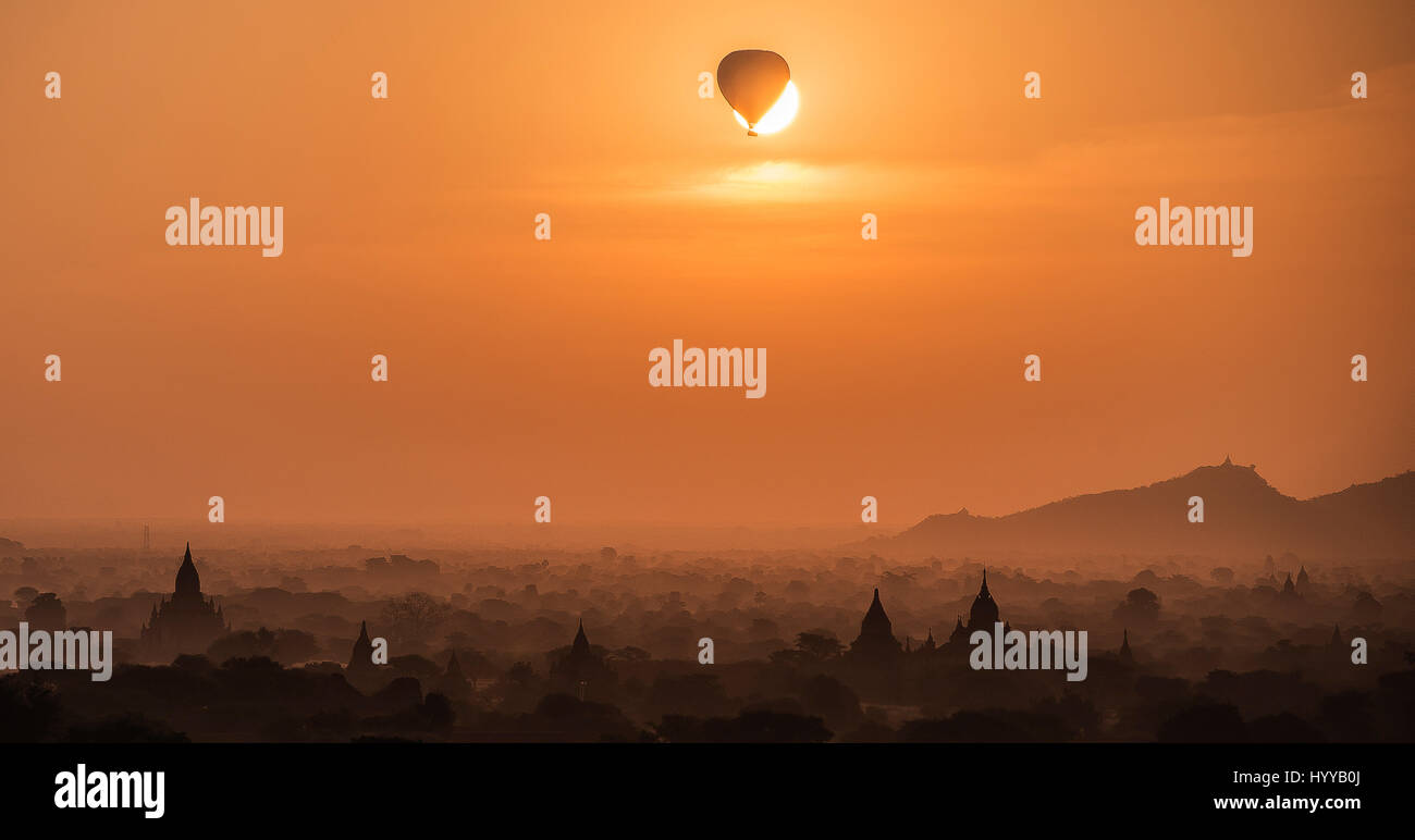 THEY say don’t fly too close to the sun but one thrill-seeking hot air balloon rider avoided Greek legend Icarus’ fate as they appear to temporarily eclipse the sun. The stunning pictures show a number of hot air balloons in the sky as the sun sets in Myanmar (Burma). Other shots capture people’s silhouettes with the orange sky of the setting sun providing the perfect backdrop. The photos were taken by Spanish student and photographer Gonzalo Navarro Bendito (22). Stock Photo