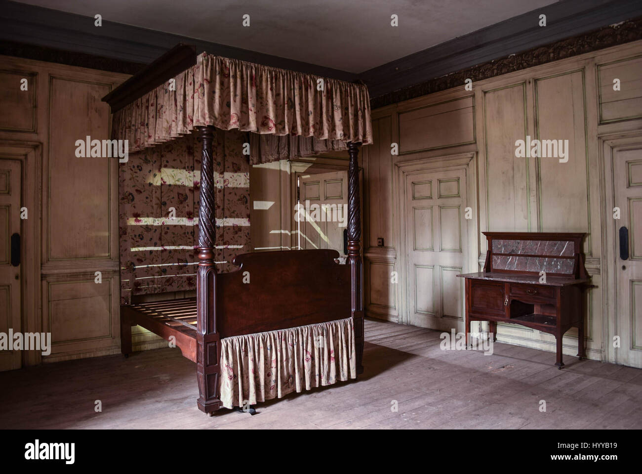 SCOTLAND, UNITED KINGDOM: STUNNING pictures offer a glimpse inside the decrepit Scottish mansion where Bonnie Prince Charlie once made his headquarters now on the open market for £1.25million despite efforts of a local trust to secure the historic building for the nation. The atmospheric images show the original four-poster bed that Prince Charles Edward Stuart slept in, and possibly sired his only daughter on, chipped banisters and a neglected snooker table with vintage scoreboard.  Other photos show a corridor of what would have been servants’ rooms and what looks like a utility room. The ho Stock Photo