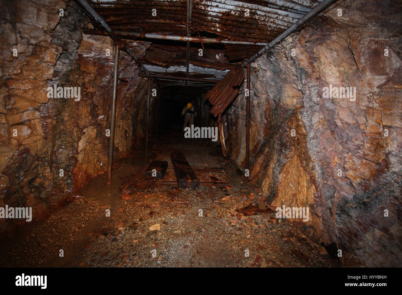 CALLINGTON, CORNWALL, UK: EERIE images reveal the Cornish mining tunnel that was once used to test explosives and research the potential impact of nuclear tests during the Cold War under the code name Operation Orpheus. The haunting pictures show inside the 2,180-foot tunnel where rusting sleepers and collapsing structures remain. Other shots, look down into an adit (entrance) and show the unsuspecting exterior of the mine where a metal gate has been closed across. The spectacular images were taken at the Excelsior Tunnel, Kit Hill, Callington, Cornwall by editor, Nat W (46) from London. To ta Stock Photo