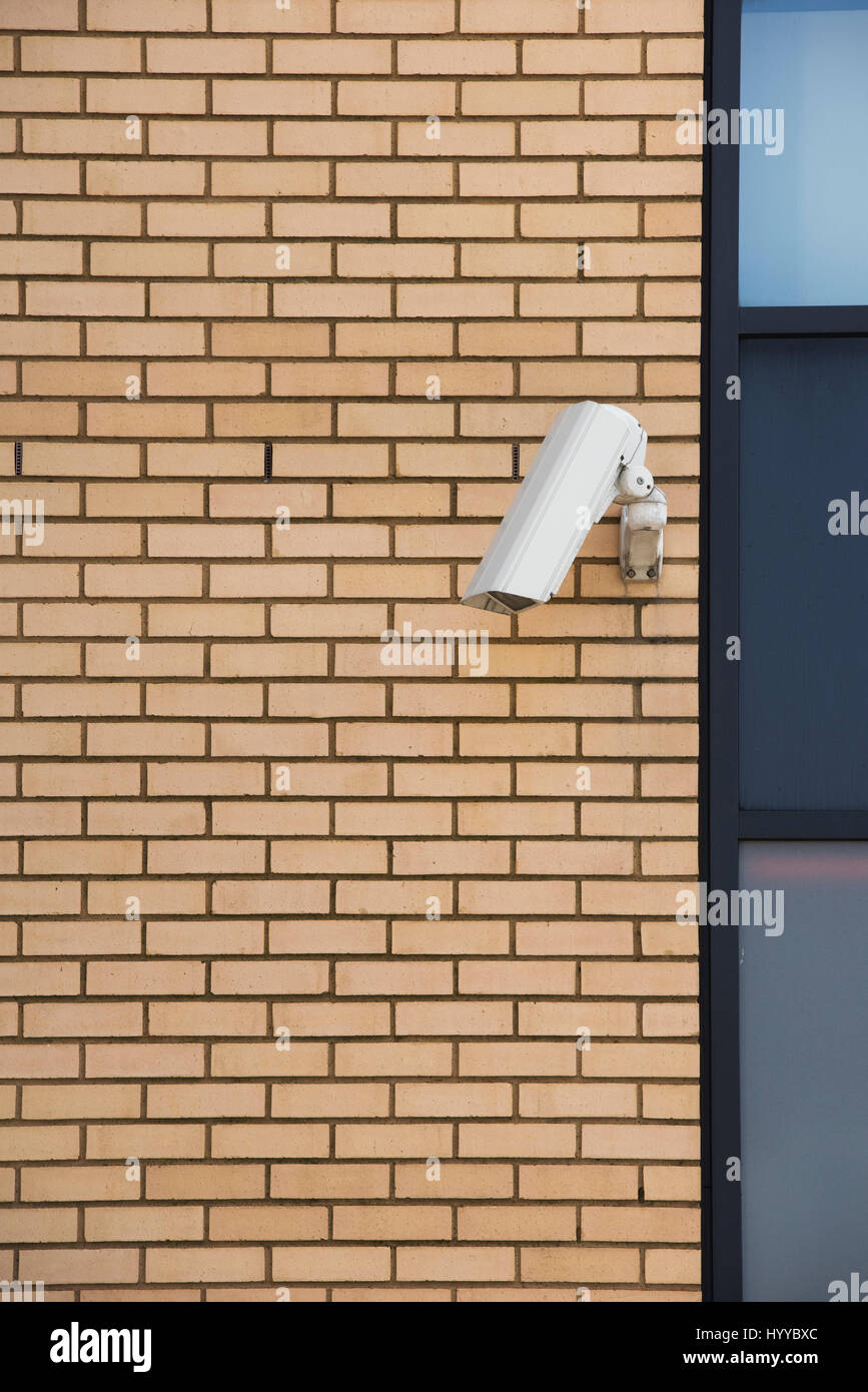 CCTV. Security camera on a brick wall. Milton Keynes. Buckinghamshire, UK Stock Photo Alamy