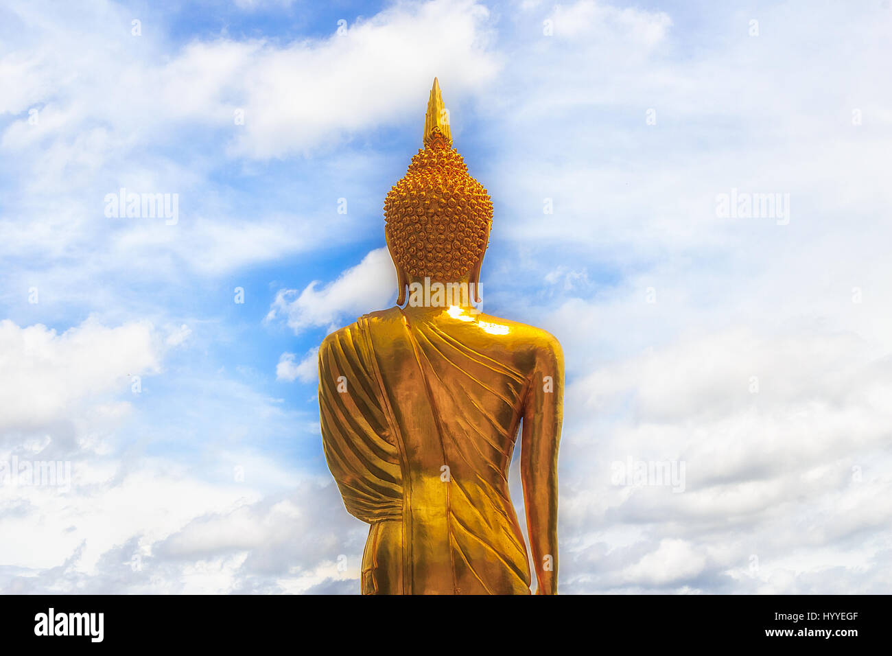 Golden Buddha Statue and blue sky in thai temple, Wat Phra That Khao ...