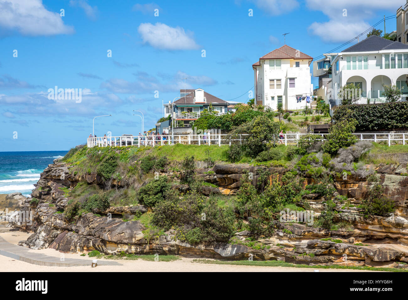 People on the coastal walk path between Bondi and Bronte, pictured here at Tamarama beach,Sydney,Australia Stock Photo