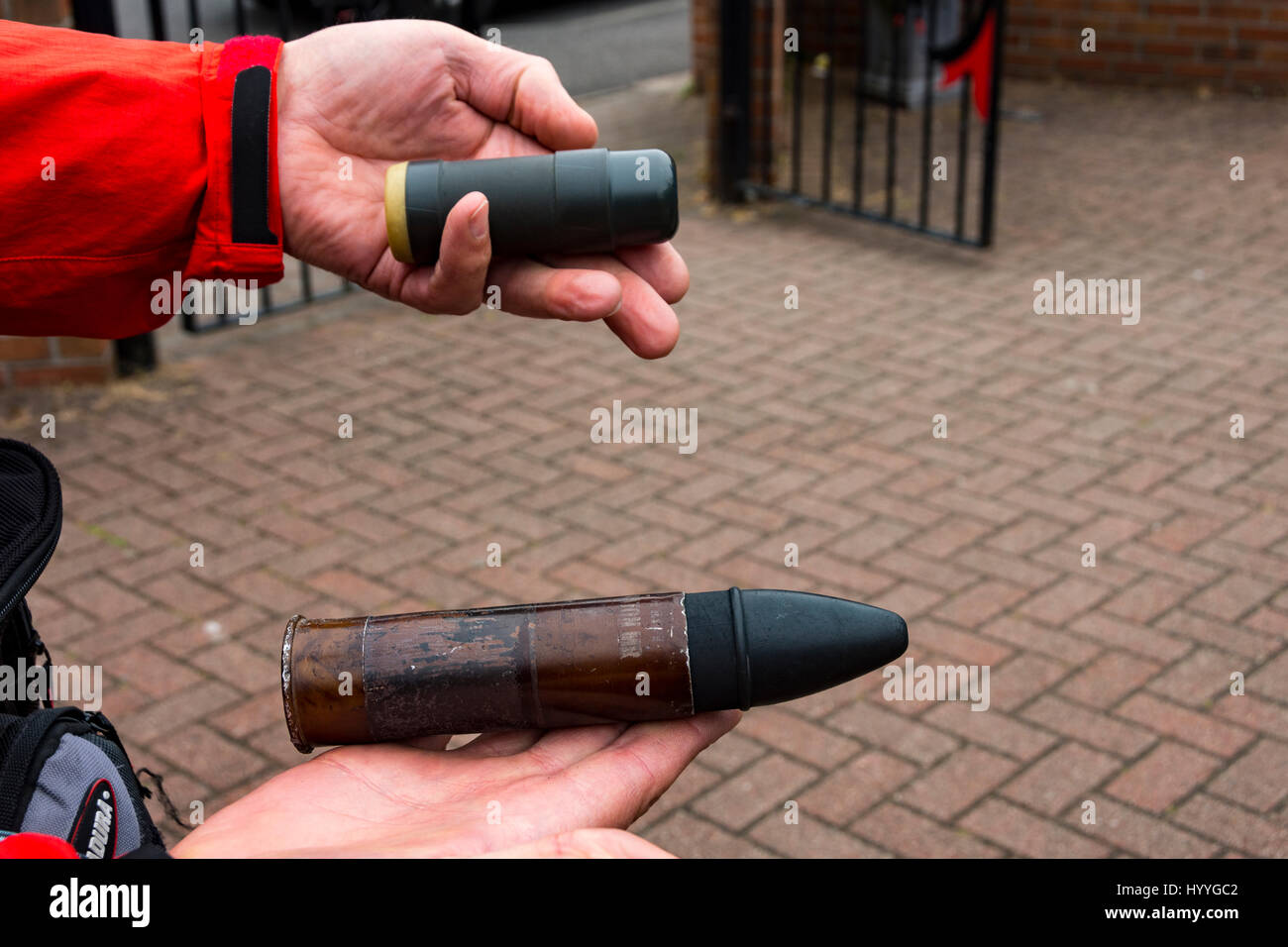 Rubber bullets, or baton rounds, held by a Taxi Tour guide, Belfast, County Antrim, Northern Ireland, UK Stock Photo