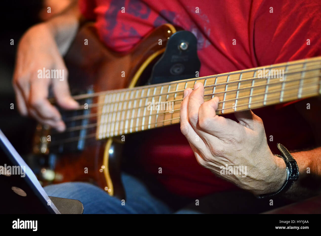 Playing Bass Guitar Stock Photo