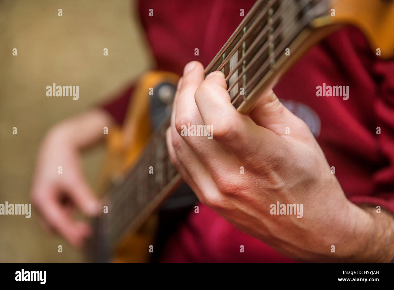 Playing Bass Guitar Stock Photo