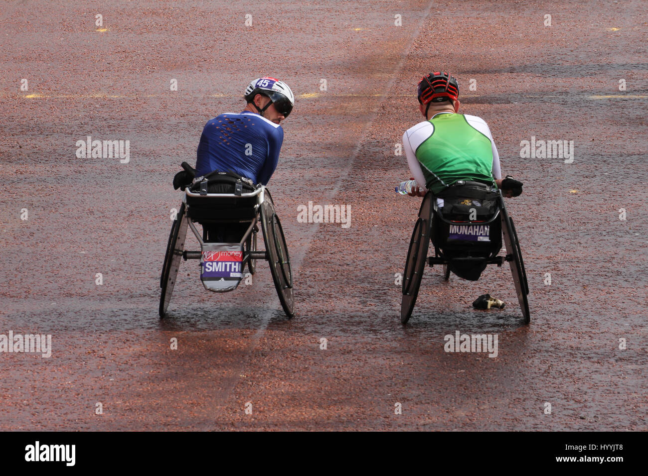 London, UK 24 April 2016. John Smith (GBR) and Patrick Munahan (IRL) seen at the Mall after finishing the Wheelchair Men T53/54.. © David Mbiyu/Alamy Live News Stock Photo