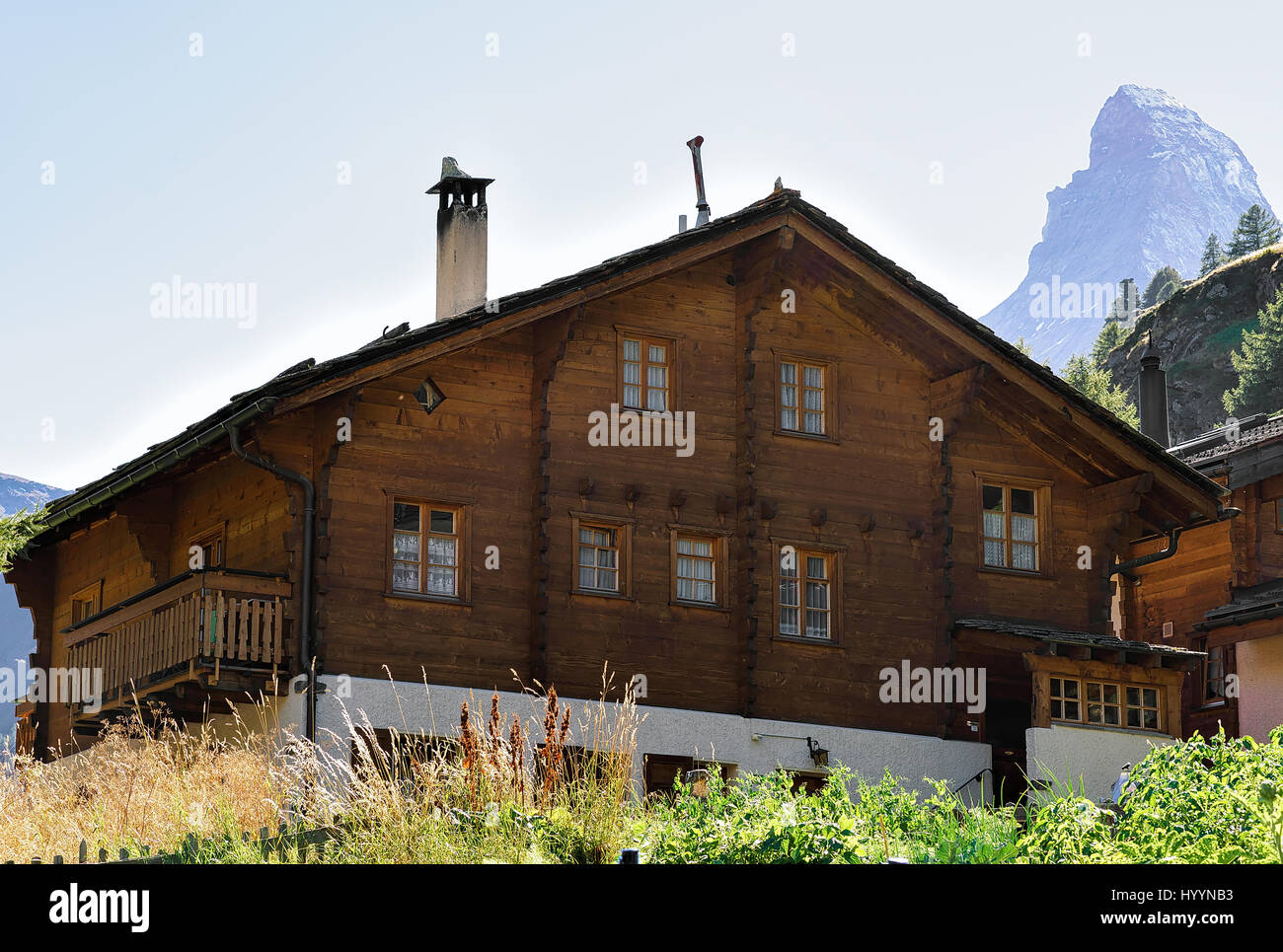 Traditional Swiss Chalet at Zermatt with Matterhorn summit, Switzerland ...