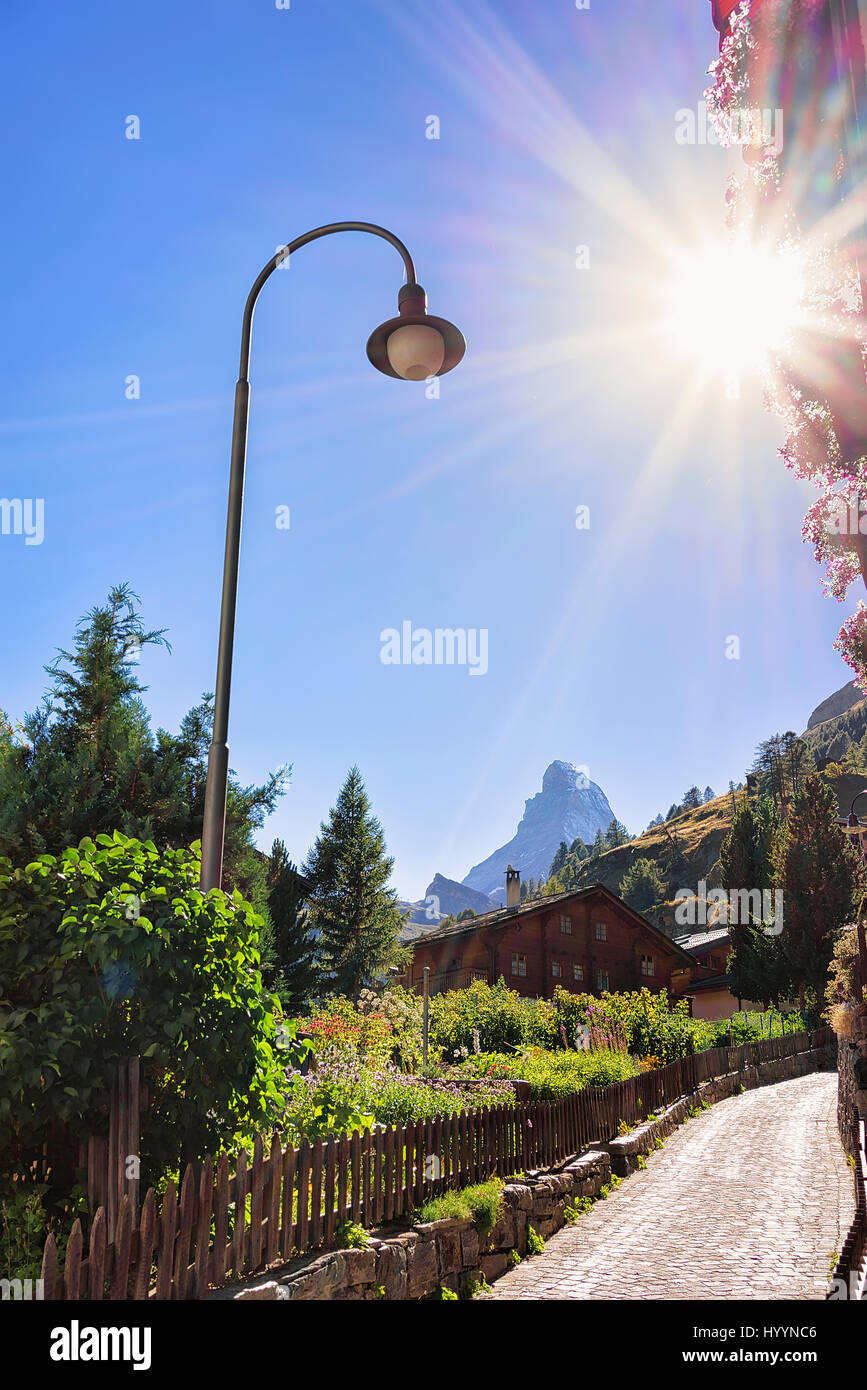 Traditional Swiss Chalets in Zermatt with Matterhorn summit ...