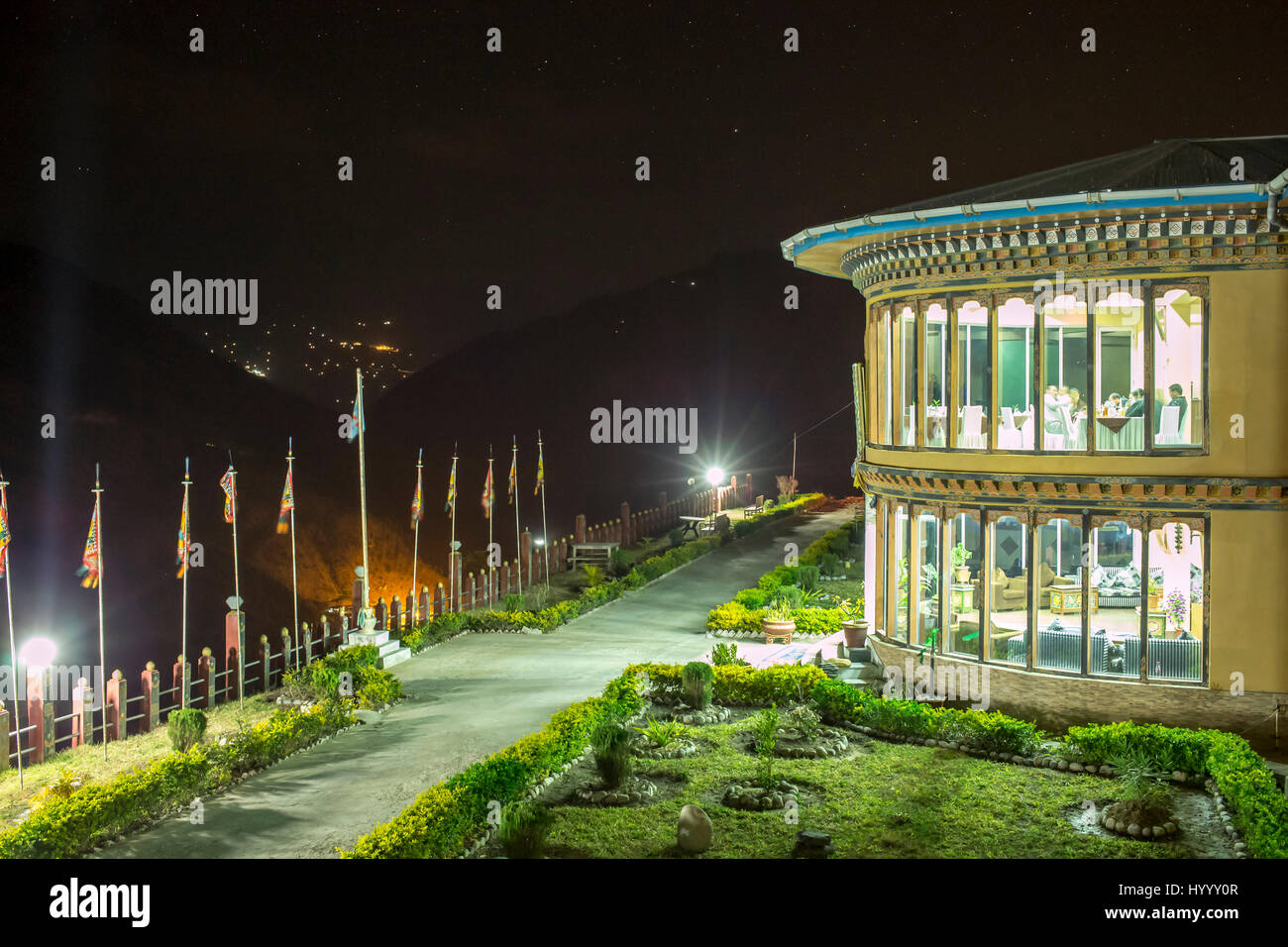 New Druk Deothjung Resort Hotel on hillside at night, Trashigang, Phomshing (Bhutan) Stock Photo