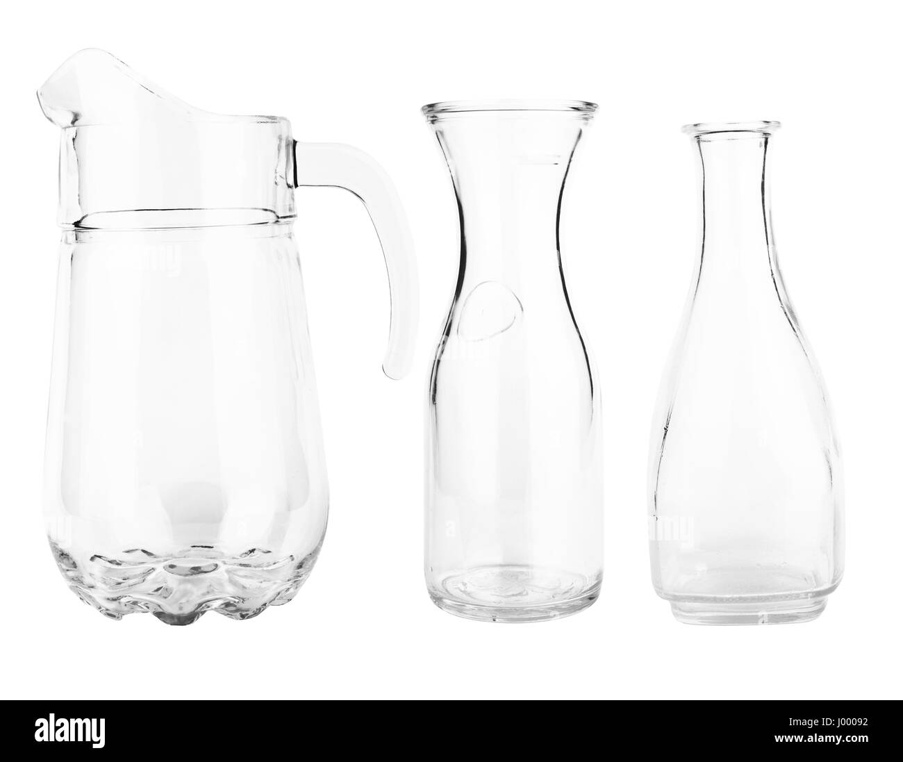 Collection of glass decanters isolated on a white Stock Photo