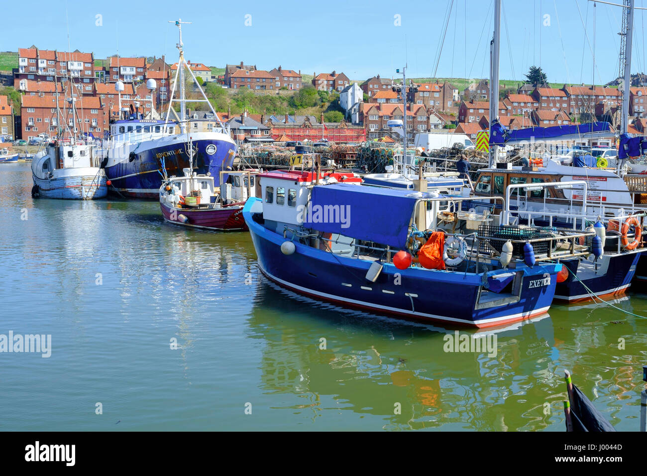 Fishing boats at Endeavour Wharf in Whitby harbour North Yorkshire UK