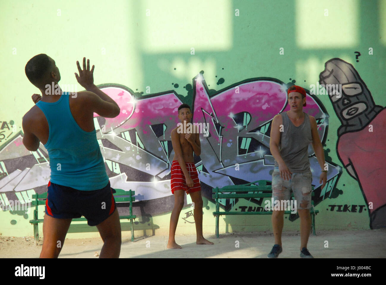 Young men playing handball on the streets of Havana, Cuba. Stock Photo