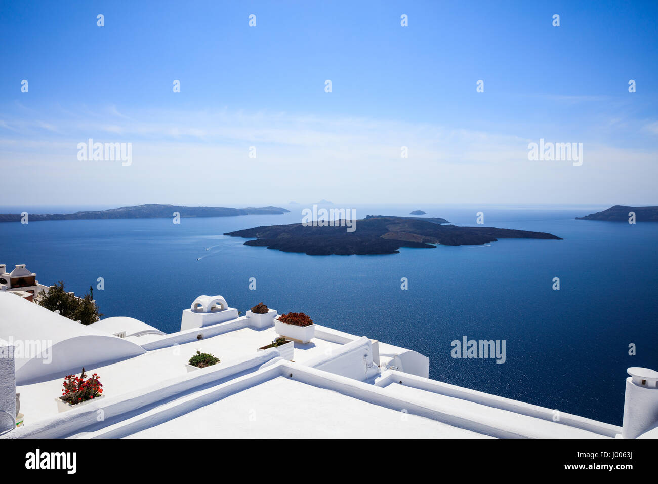 Santorini island, Greece - White roofs and caldera view Stock Photo - Alamy