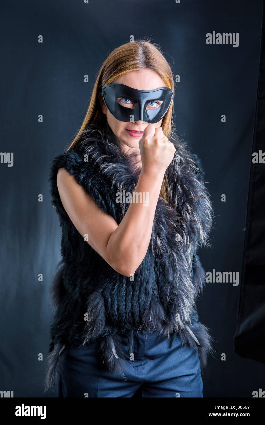 Wearing black mask hi-res stock photography and images - Alamy