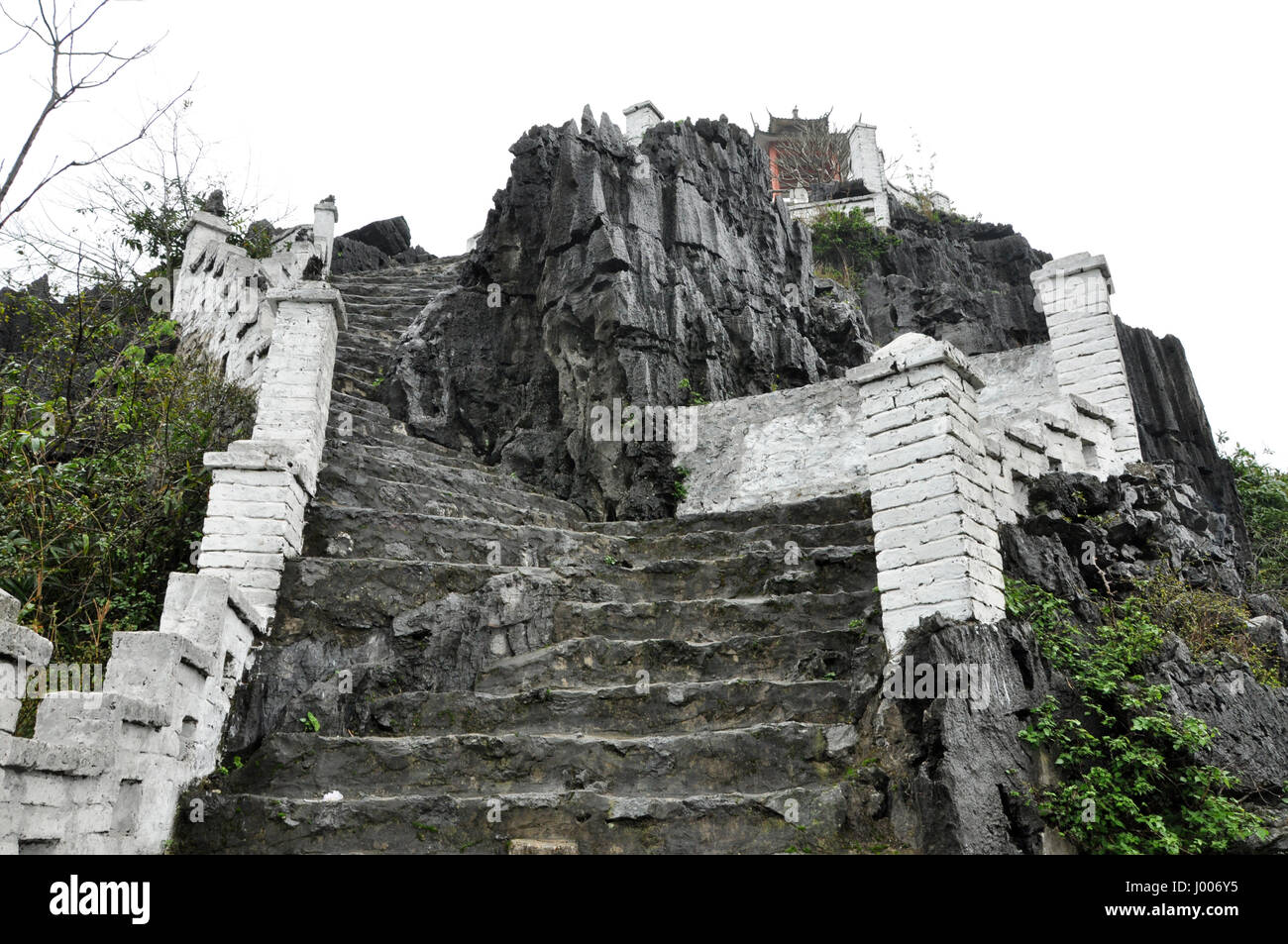 Ascending stone staircase to the Hang Mua pagoda, Ninh Binh, Vietnam Stock Photo