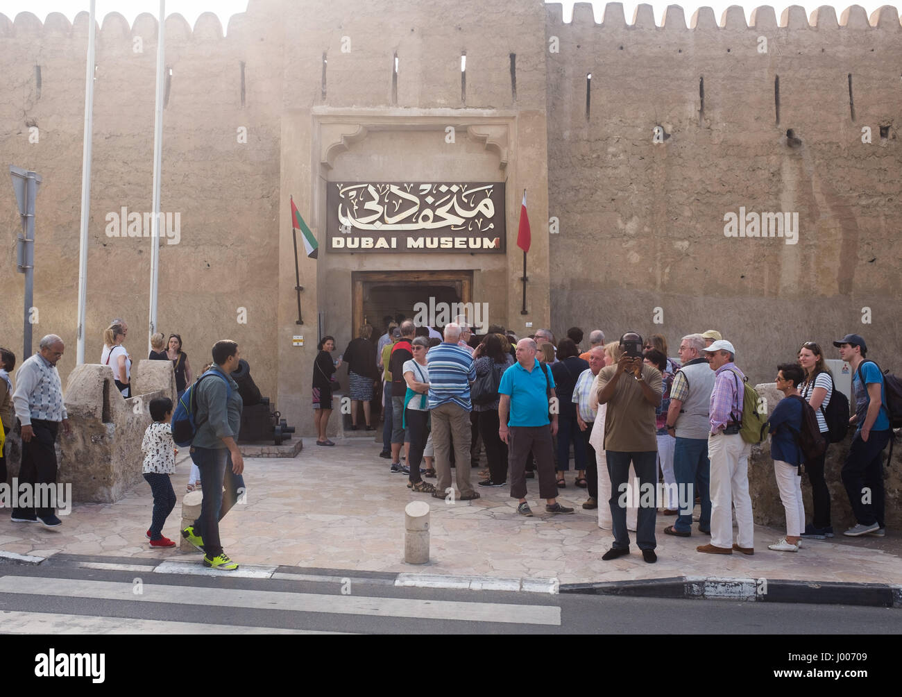 Tourists line up outside the Dubai Museum, Stock Photo