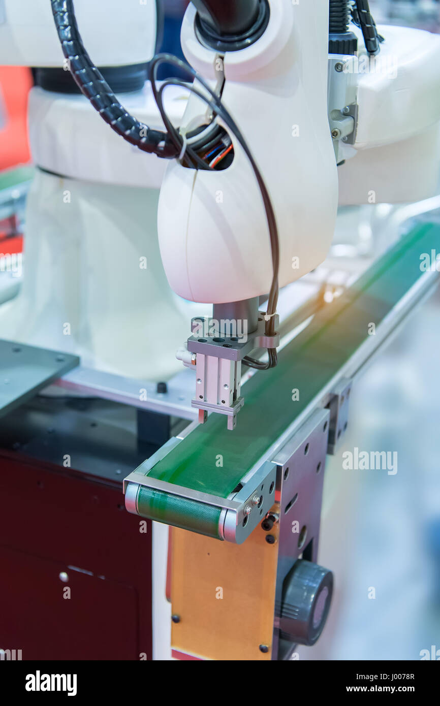 industrial machine and factory robot arm,Smart factory industry 4.0 concept. Stock Photo