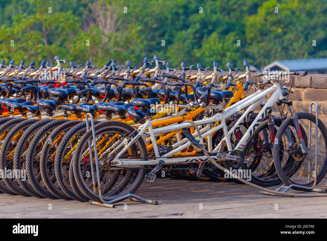 Bicycle Hire on Xian city wall China Stock Photo