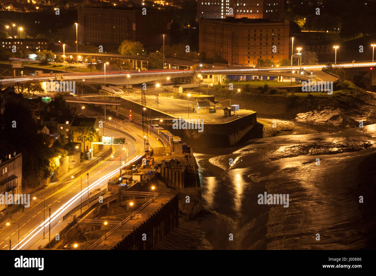 Trails of lights on Bristol's Portway road beside the Floating Harbour