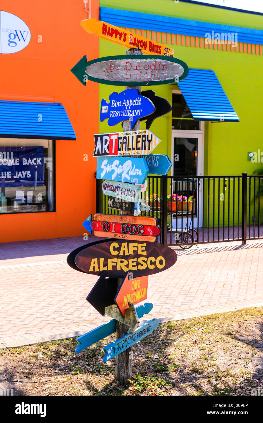 Multiple advrtising signs to stores, Cafes and art galleries in