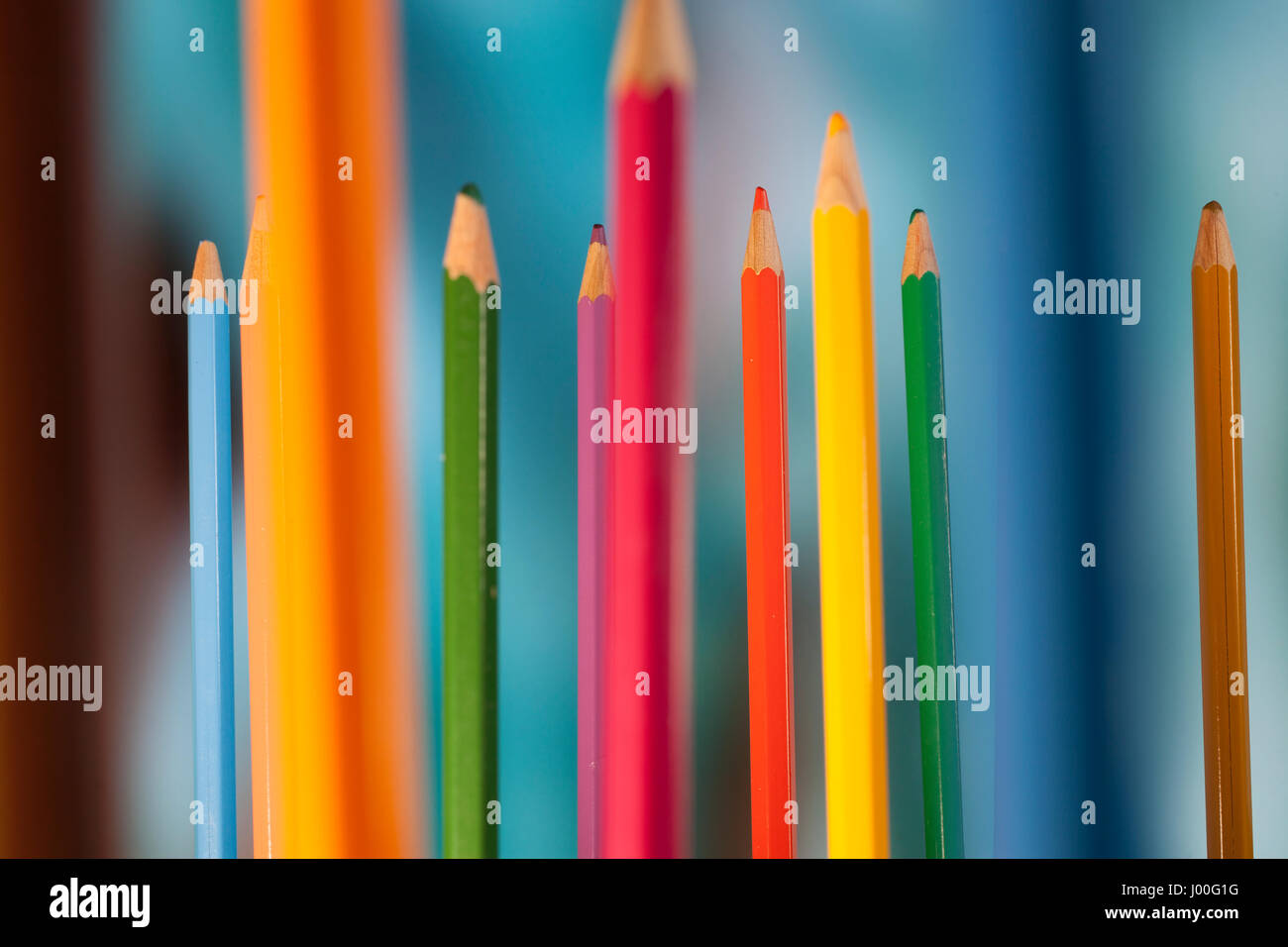 Macro composition of colored pencils standing upright Stock Photo