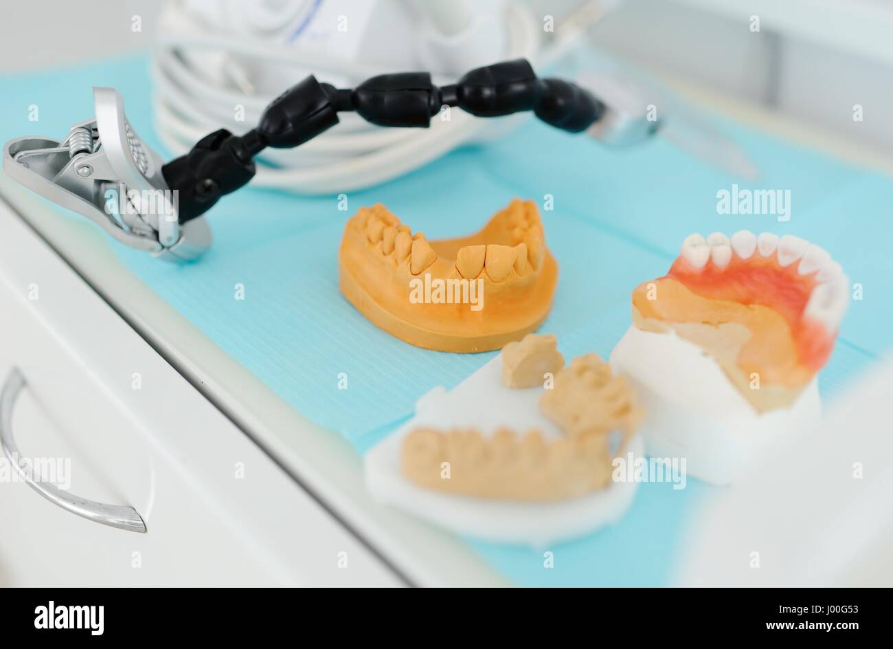 Gypsum models of dentures on the table closeup. Dental prosthetics