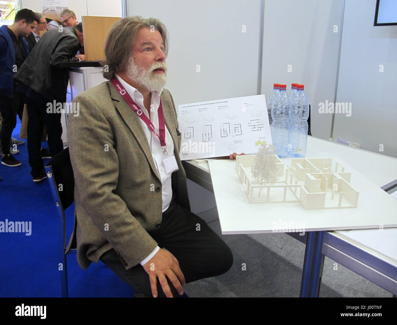 Geneva, Switzerland. 29th Mar, 2017. Igor Ustinov, son of the late actor Peter Ustinov, presents a construction system for pre-constructed houses made of recycled plastic bottles at the Inventions fair in Geneva, Switzerland, 29 March 2017. Photo: Christiane Oelrich/dpa/Alamy Live News Stock Photo