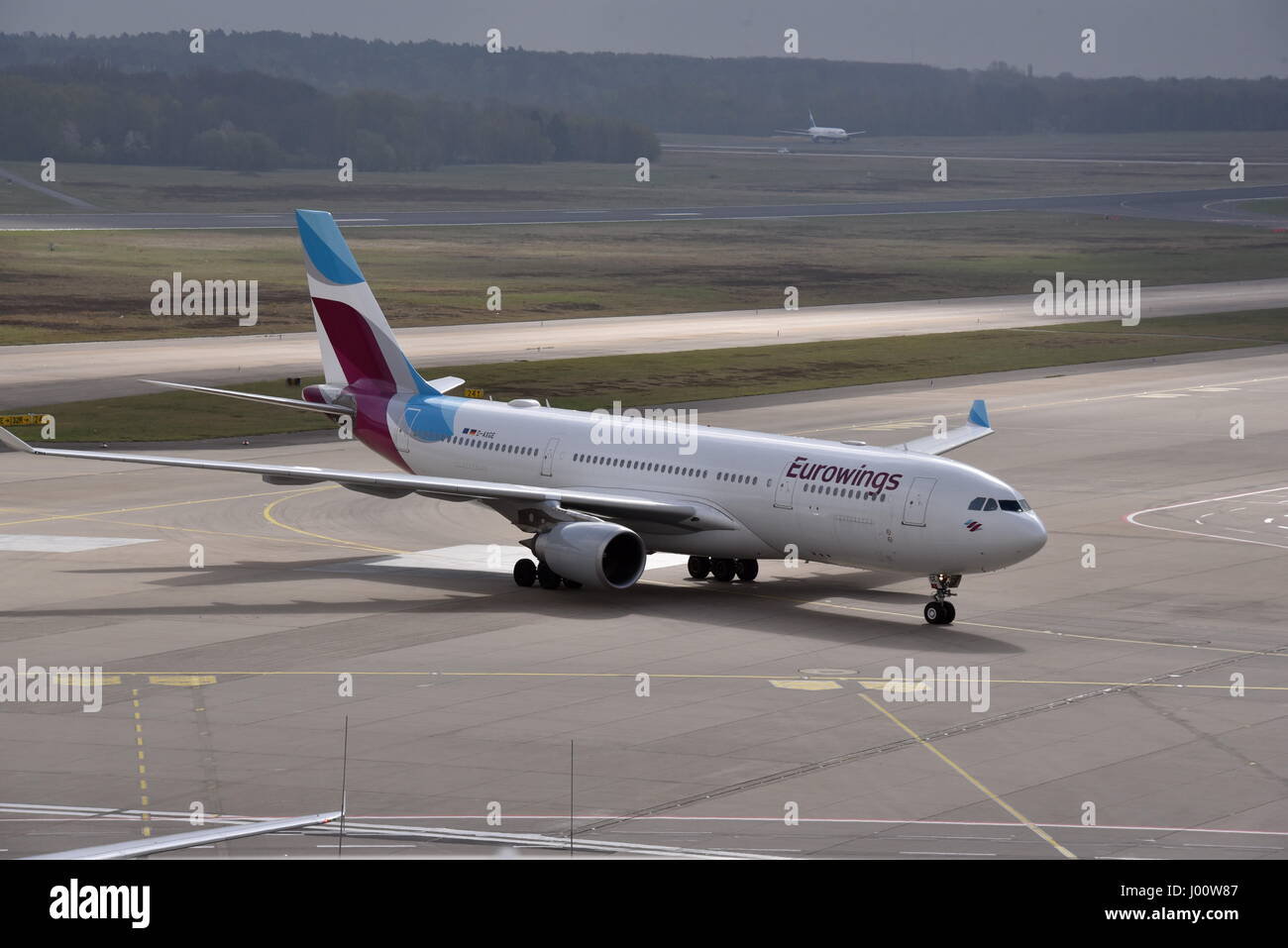 Cologne, Germany. 06th Apr, 2017. A Eurowings Airbus 330 aircraft seen on the runway at the Cologne Bonn airport in Cologne, Germany, 06 April 2017. Photo: Horst Galuschka/dpa/Alamy Live News Stock Photo