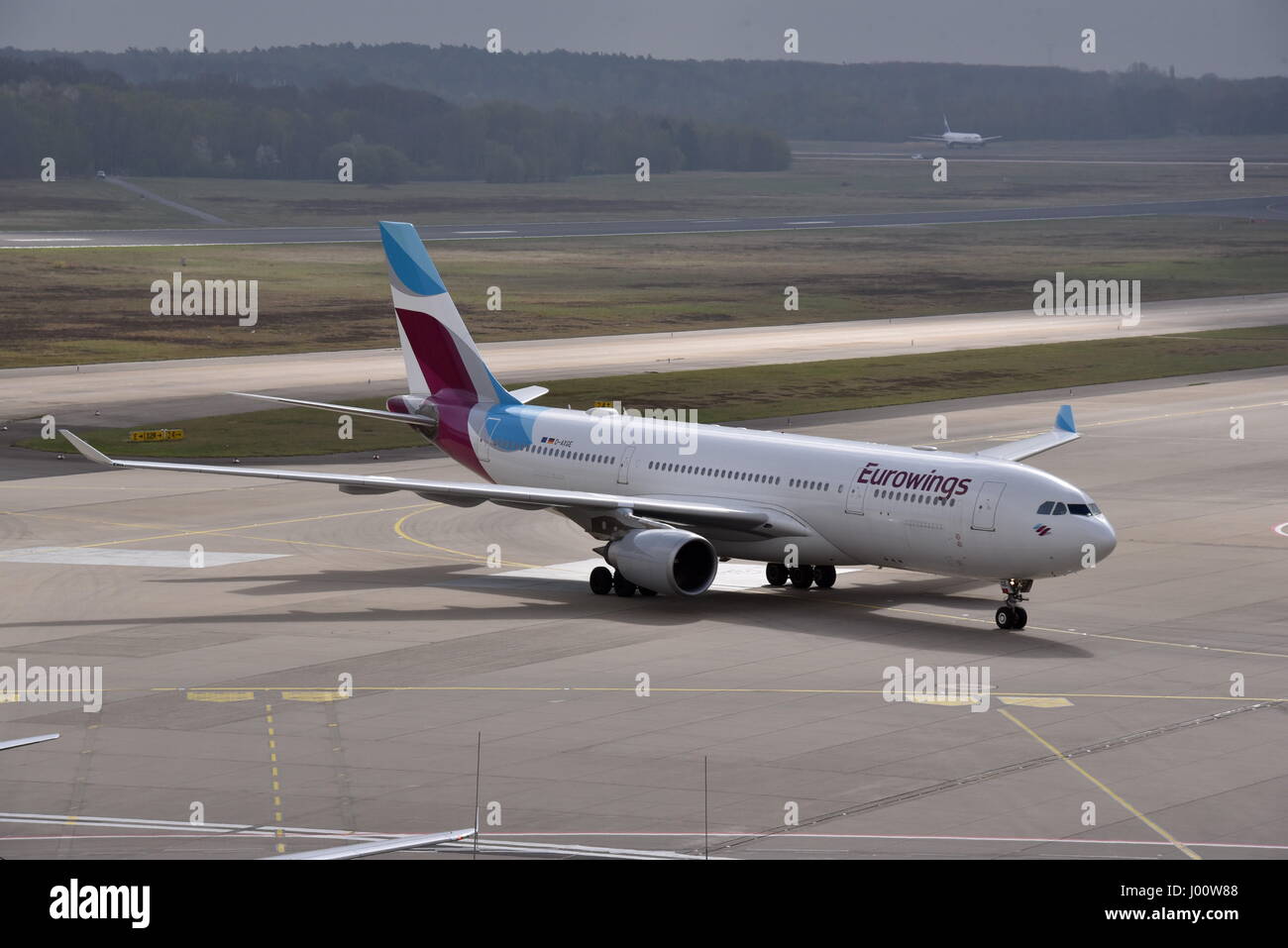Cologne, Germany. 06th Apr, 2017. A Eurowings Airbus 330 aircraft seen on the runway at the Cologne Bonn airport in Cologne, Germany, 06 April 2017. Photo: Horst Galuschka/dpa/Alamy Live News Stock Photo