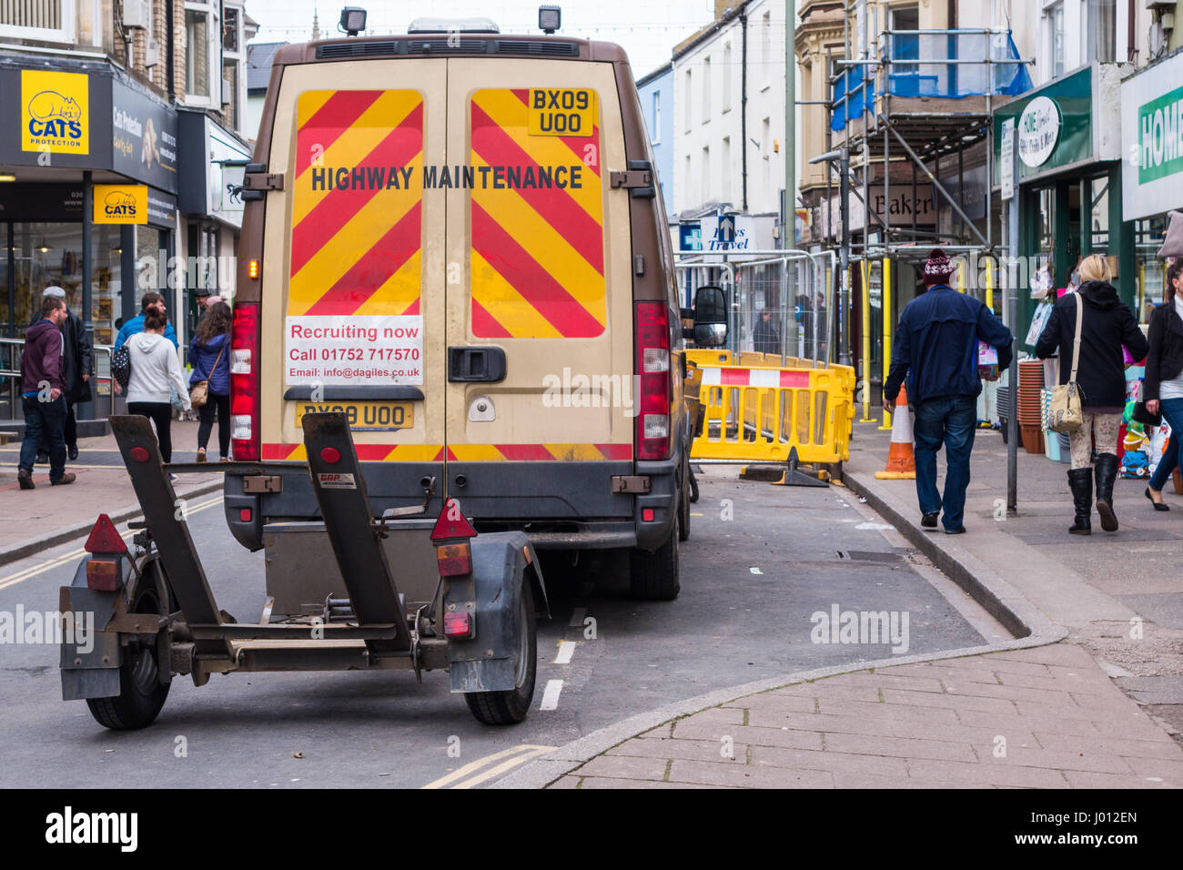 Highway maintenance van in Teignmouth town centre, centre, doing repairs to  the road Stock Photo - Alamy