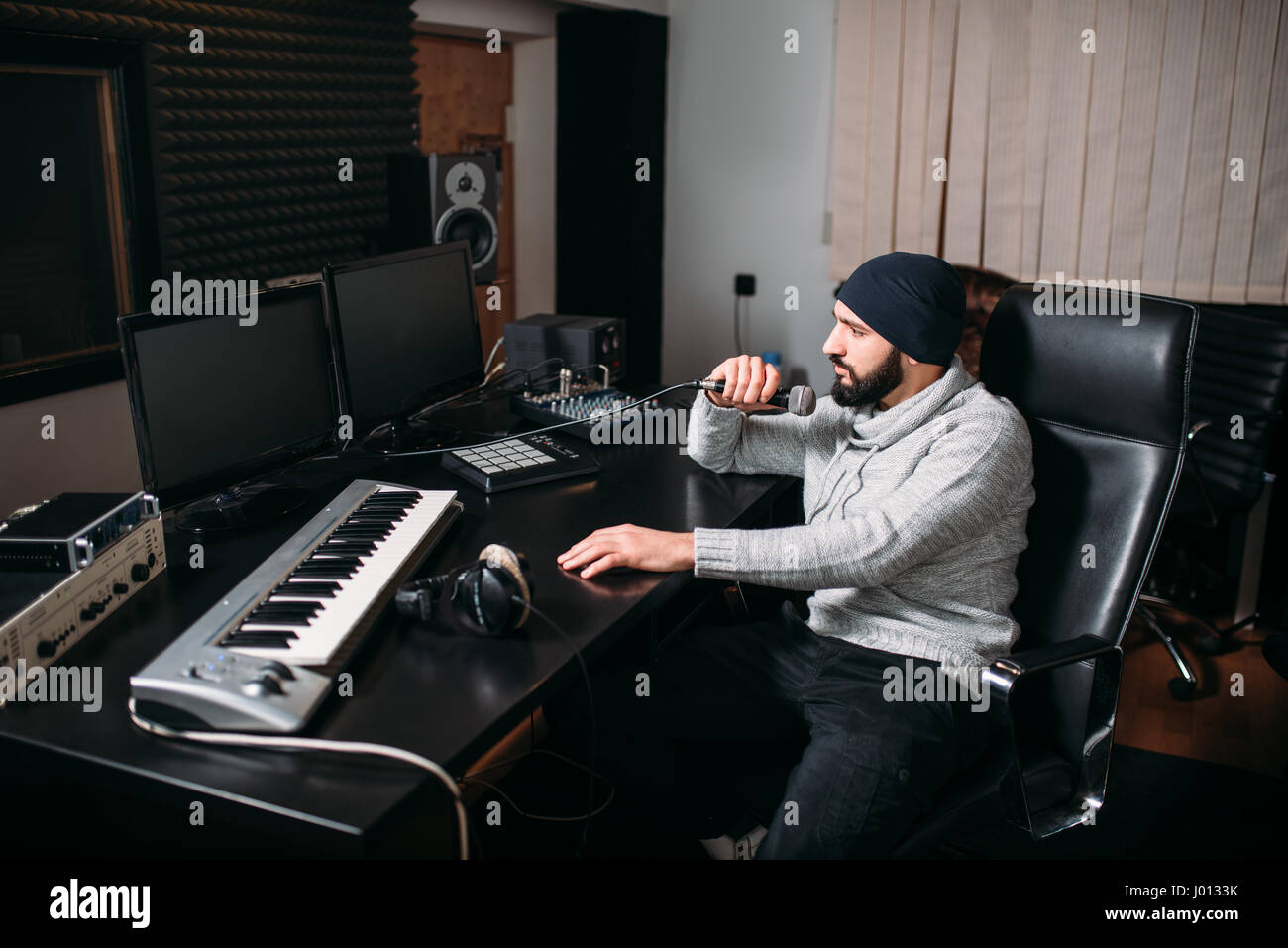 Sound Producer With Microphone In Music Studio Professional Digital Audio Record Technology Sound Producer With Microphone In Music Studio Professional Digital Audio Record Technology