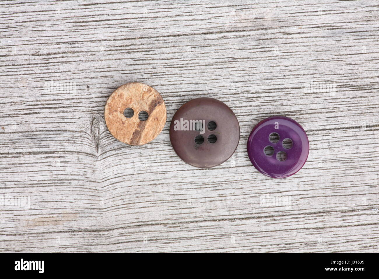 Three wooden buttons hi-res stock photography and images - Alamy