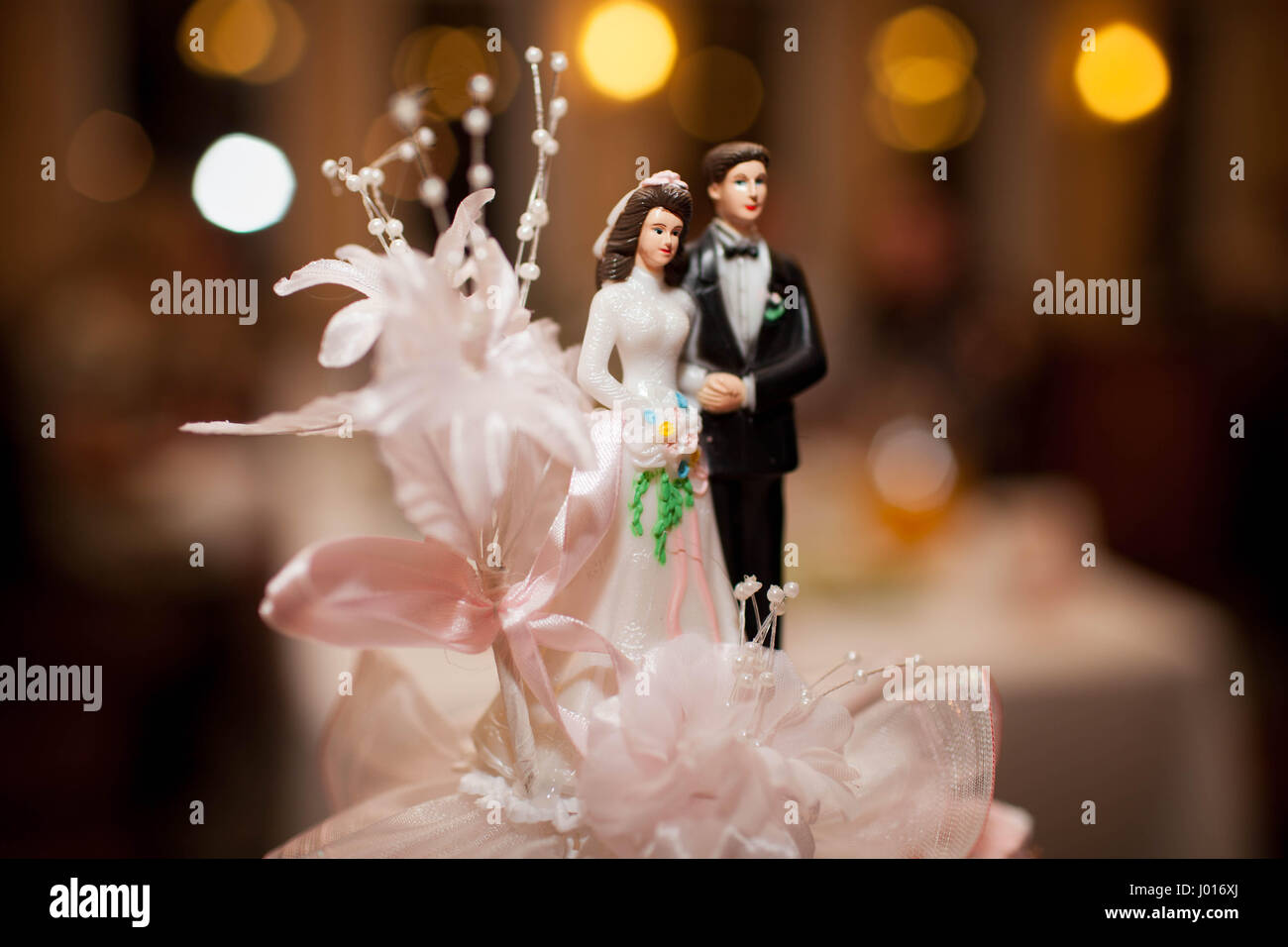 Wedding Cake With Bride And Groom Figurines Stock Photo