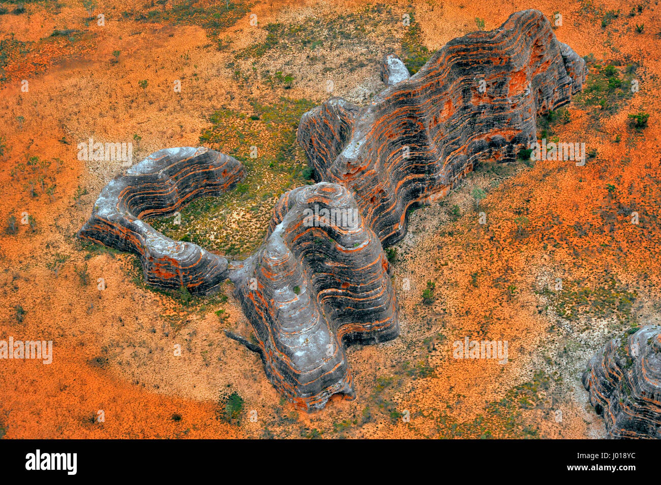 The red ochre rocks of the Bungle Bungle Range ( Purnululu National Park) in the Kimberley region of Western Australia. Stock Photo