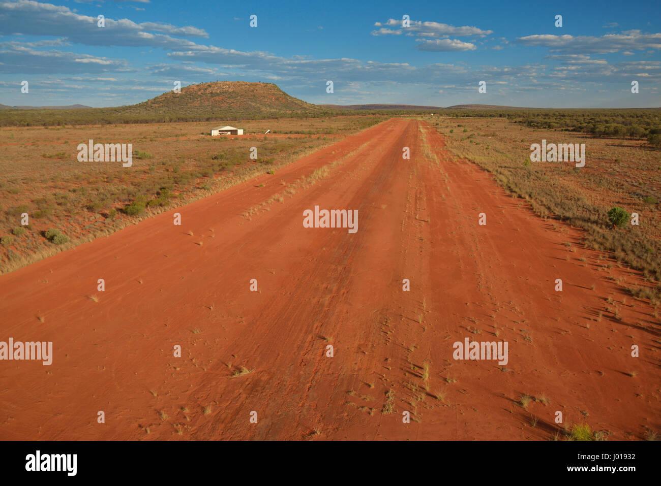 Red earth airstrip in the outback of Australia's Northern Territory. Stock Photo
