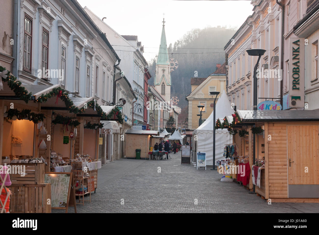 Picture of Christmas fair in Celje, Slovenia. Old and beautiful city has a long tradition of Christmas markets, and fairy land awaits kids in winter. Stock Photo