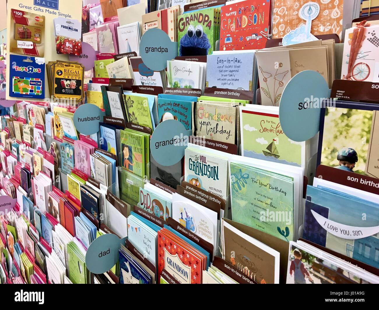 Greeting cards, birthday cards, romantic cards, get well cards, holiday  cards at a grocery store card shop Stock Photo - Alamy
