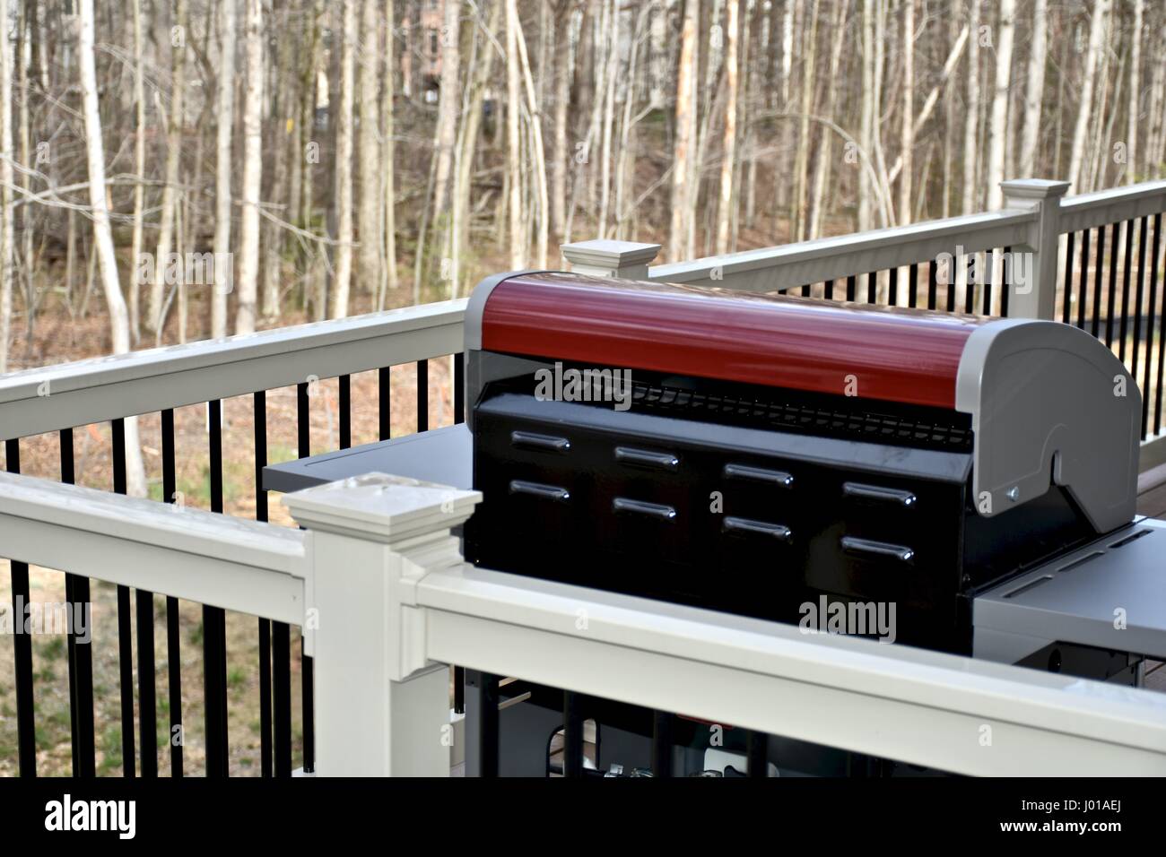 BBQ grill on house deck Stock Photo Alamy