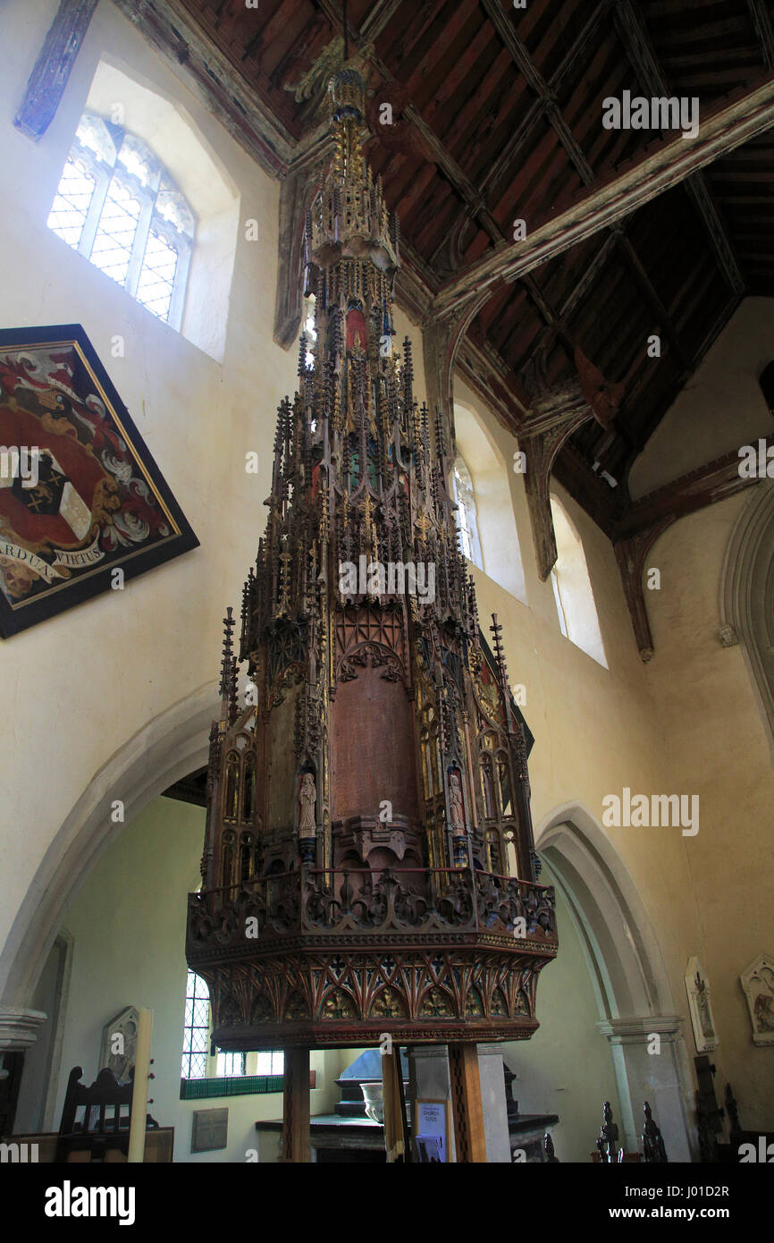 Ornately decorated large wooden baptismal font cover Ufford church