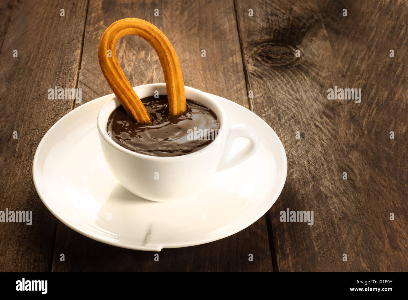 Photo of churros con chocolate, traditional Spanish dessert Stock Photo